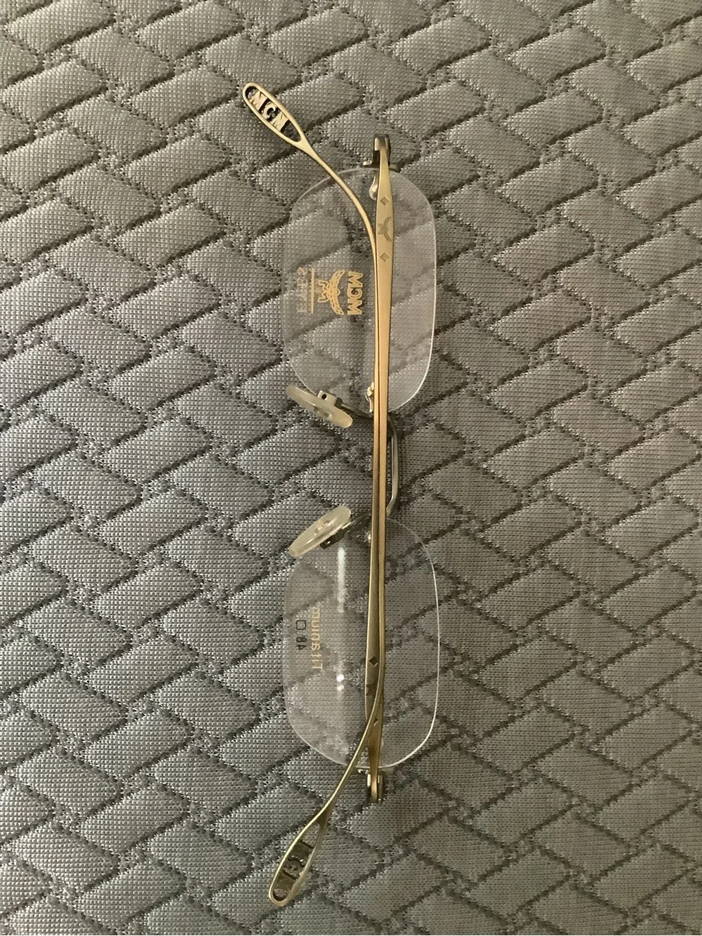 MCM Rimless Titanium Eyeglasses in Gold Tone
